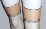 Vintage goldfarbene US Nylonstr�mpfe mit schwarzem Streifen